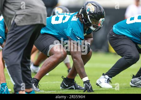 Jacksonville Jaguars offensive tackle Anton Harrison (76) puts on his helmet  before a drill during an NFL football practice, Monday, June 12, 2023, in  Jacksonville, Fla. (AP Photo/John Raoux Stock Photo - Alamy