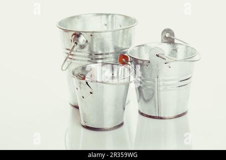 Three metal buckets Stock Photo
