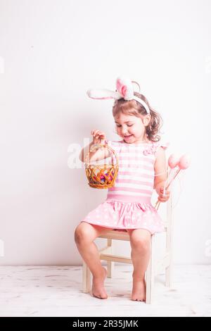 Girl eats a chocolate eggs Stock Photo