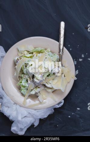 Caesar salad with Parmesan cheese (seen from above) Stock Photo