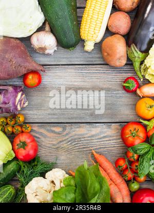 Vegetables on wooden table Stock Photo