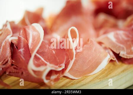 Sliced Parma ham (close up) Stock Photo