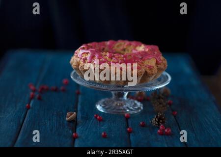 Gluten-free cranberry cake on a cake stand Stock Photo
