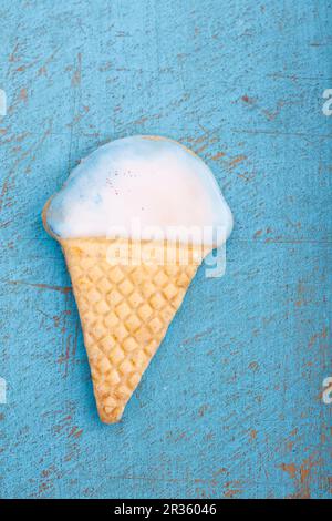 An ice cream-shaped biscuit with white icing Stock Photo