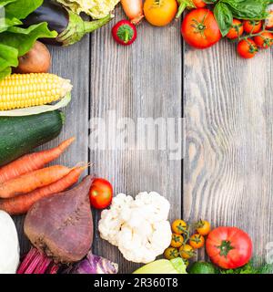 Vegetables on wooden table Stock Photo