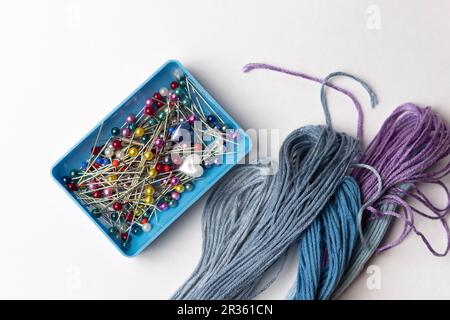 Sewing Pins and Thread / Embroidery Accessories Stock Photo
