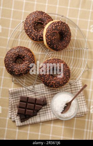 Chocolate-glazed doughnuts Stock Photo