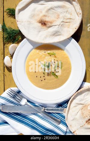 Fava bean dip with pita bread Stock Photo