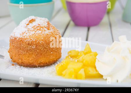 Coconut cake with fresh pineapple and whipped cream Stock Photo