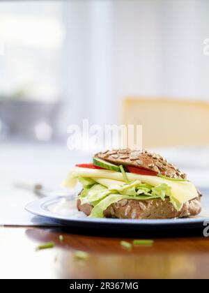A sunflower seed roll with Gouda Stock Photo