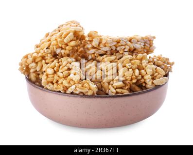 Bowl of puffed rice bars (kozinaki) on white background Stock Photo