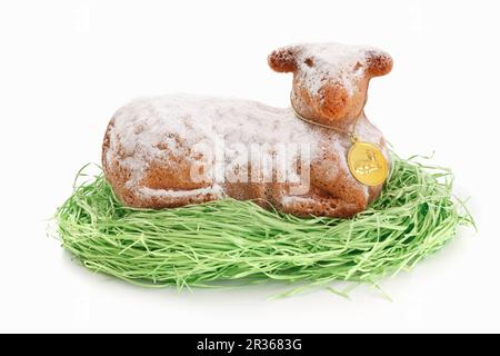 A baked Easter lamb on decorative grass Stock Photo