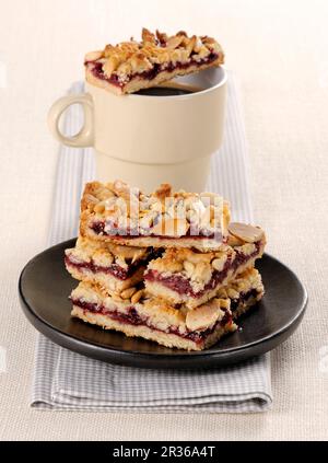 Cherry slices with almonds Stock Photo