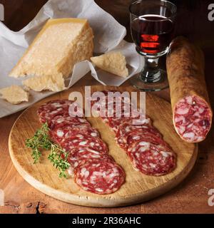 Salchichon and Parmesan cheese with red wine Stock Photo