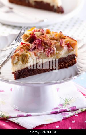 A slice of chocolate cheesecake with rhubarb Stock Photo