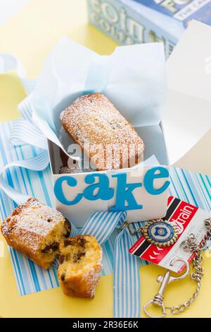 Mini raisin cakes dusted with icing sugar Stock Photo