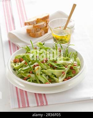 Chicory salad with bacon Stock Photo