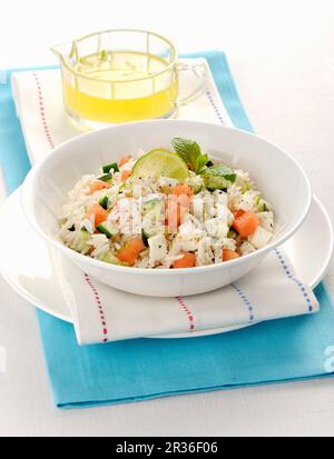 Rice salad with watermelon and Primosale cheese Stock Photo