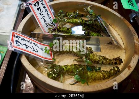 Root vegetables at Nishiki market in Kyoto, Japan Stock Photo