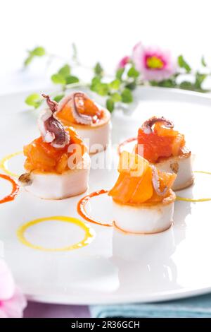 Scallops with salmon and baby octopus Stock Photo