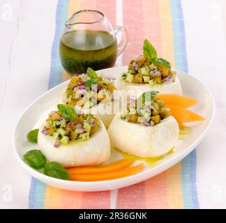 Mozzarelle ripiene (stuffed mozzarella with basil sauce, Italy) Stock Photo