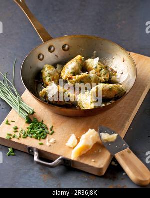 Cheese dumplings with chives Stock Photo