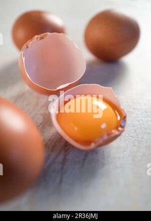An egg yolk in an eggshell Stock Photo