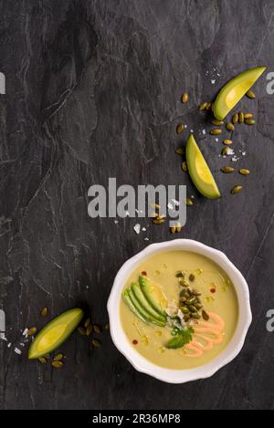 Chilled avocado soup with pumpkin seeds (seen from above) Stock Photo