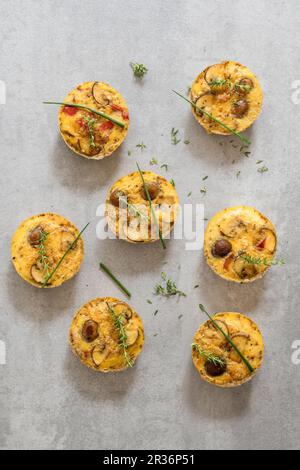 Mini frittatas with mushrooms, pepper and herbs (low-carb) Stock Photo