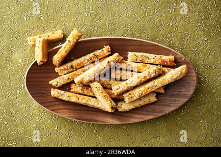 Savoury shortbread sticks with sesame seeds and rosemary Stock Photo