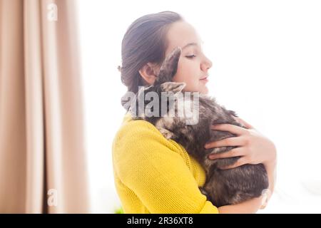 Girl with her favorite pet Stock Photo