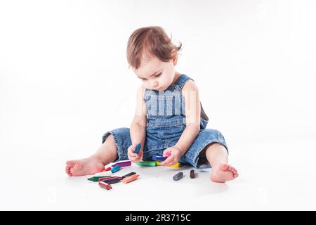 Baby girl is writting Stock Photo