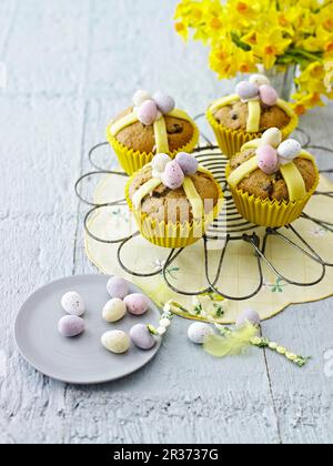 Hot cross muffin topped with chocolate mini eggs Stock Photo