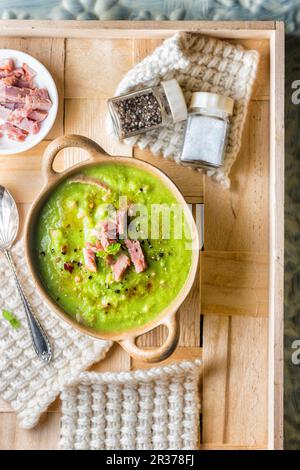 Pea soup with ham and peppermint Stock Photo