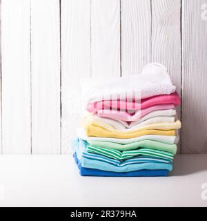 Folded baby clothes Stock Photo