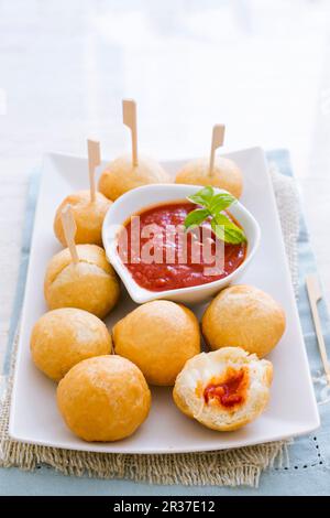 Deep-fried pizza panzerotti with tomato sauce Stock Photo