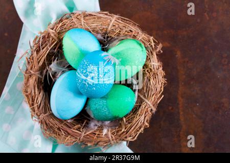 Dyed Easter eggs with batik patterns in a basket Stock Photo