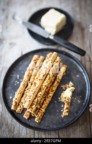 Puff pastry sticks with butter Stock Photo