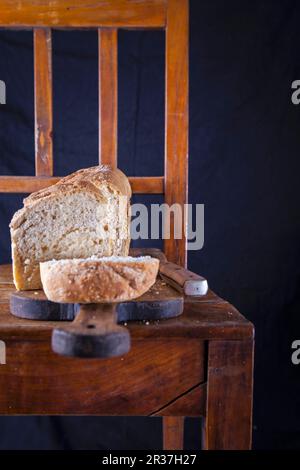 Coconut toast bread, sliced, on a chopping board Stock Photo