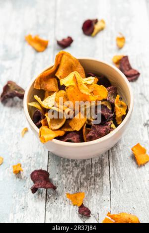 Colourful vegetable crisps in a bowl Stock Photo