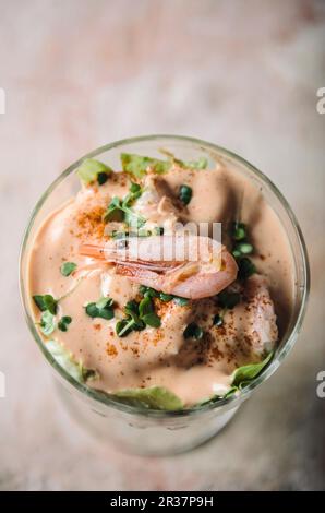 Shrimp cocktail with iceberg lettuce and cress in a glass Stock Photo