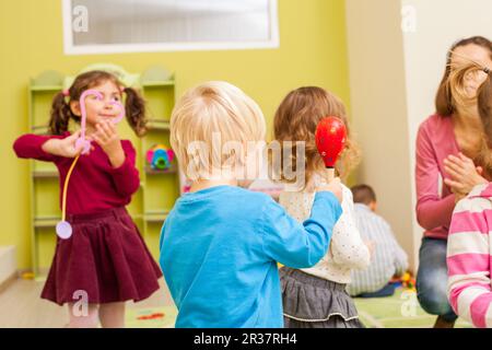 Group of little children dancing Stock Photo