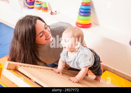 Interaction between mother and baby Stock Photo