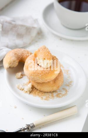 Mini doughnuts on a white plate Stock Photo