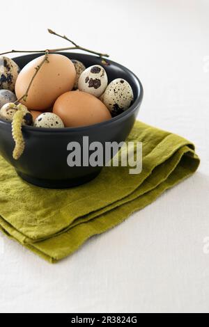 Easter eggs in a small bowl Stock Photo