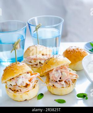Mini hamburgers with pulled chicken and coleslaw Stock Photo