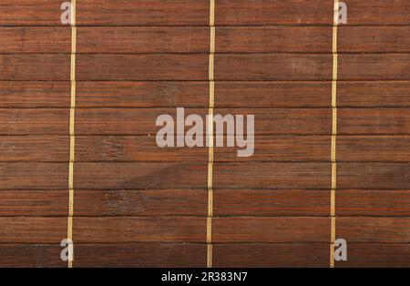 Bamboo wooden brown wicker braided mat background Stock Photo