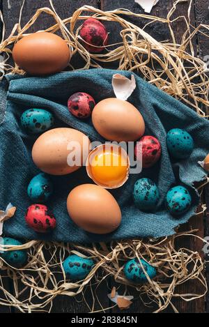 Colorful Easter eggs on wooden background Stock Photo