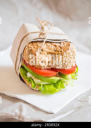 Fresh vegetarian goat cheese and vegetable sandwich on a whole grain bread Stock Photo