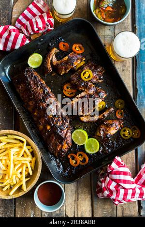 Pork ribs on a baking sheet Stock Photo